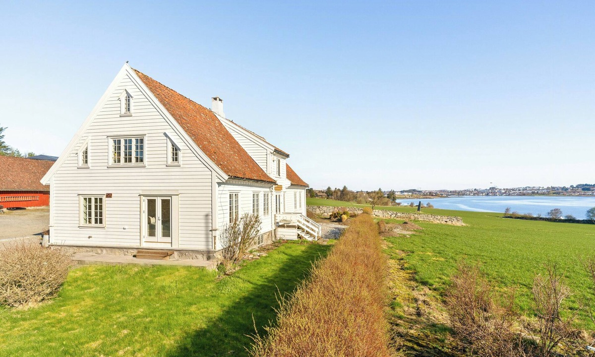 Tananger House | 200-year-old timber house by the sea in Tananger