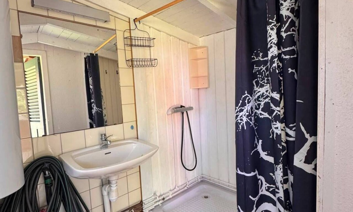 Lervik Cottage | A simple summer cottage located about 200 m from a fantastic sandy beach.
