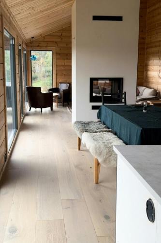 Lunner House | Architect-Designed Log Cabin By Myllavannet