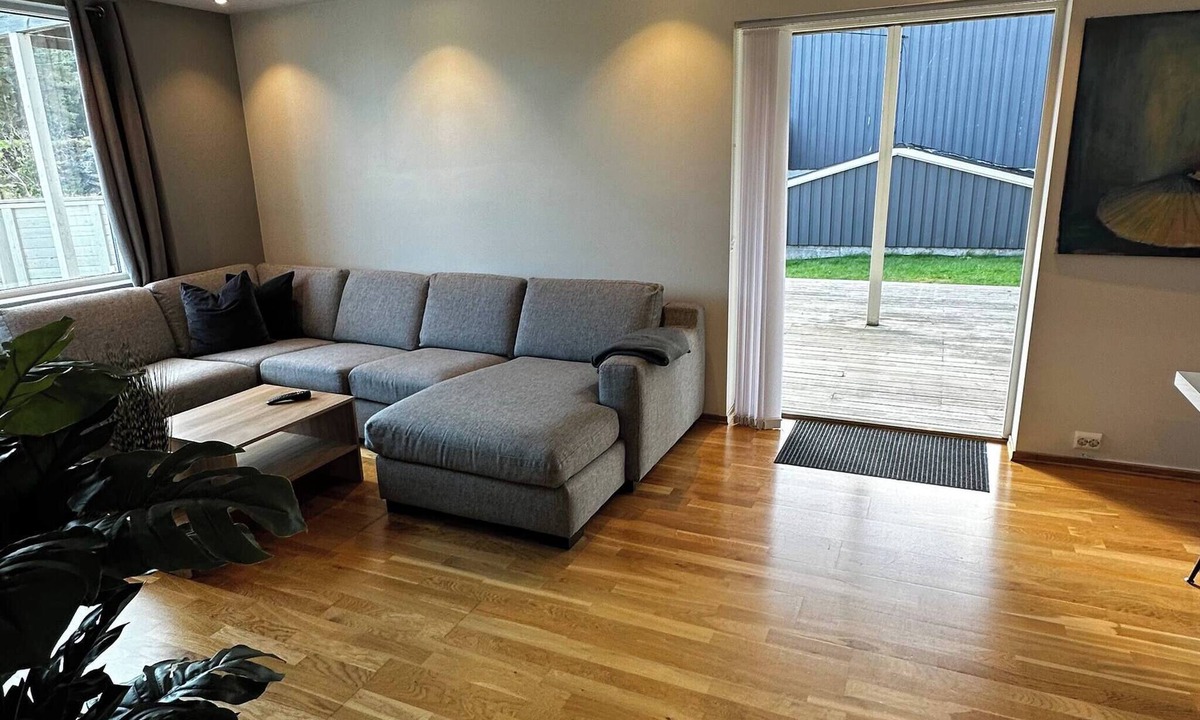 Flekkerøy Apartment | Bright Apartment with Patio and Garden