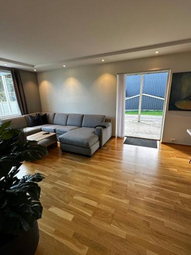 Flekkerøy Apartment | Bright Apartment with Patio and Garden