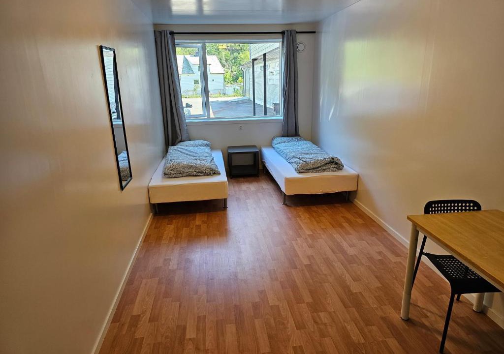 Flekkefjord Hotel | Brufjell Hostel & Parking