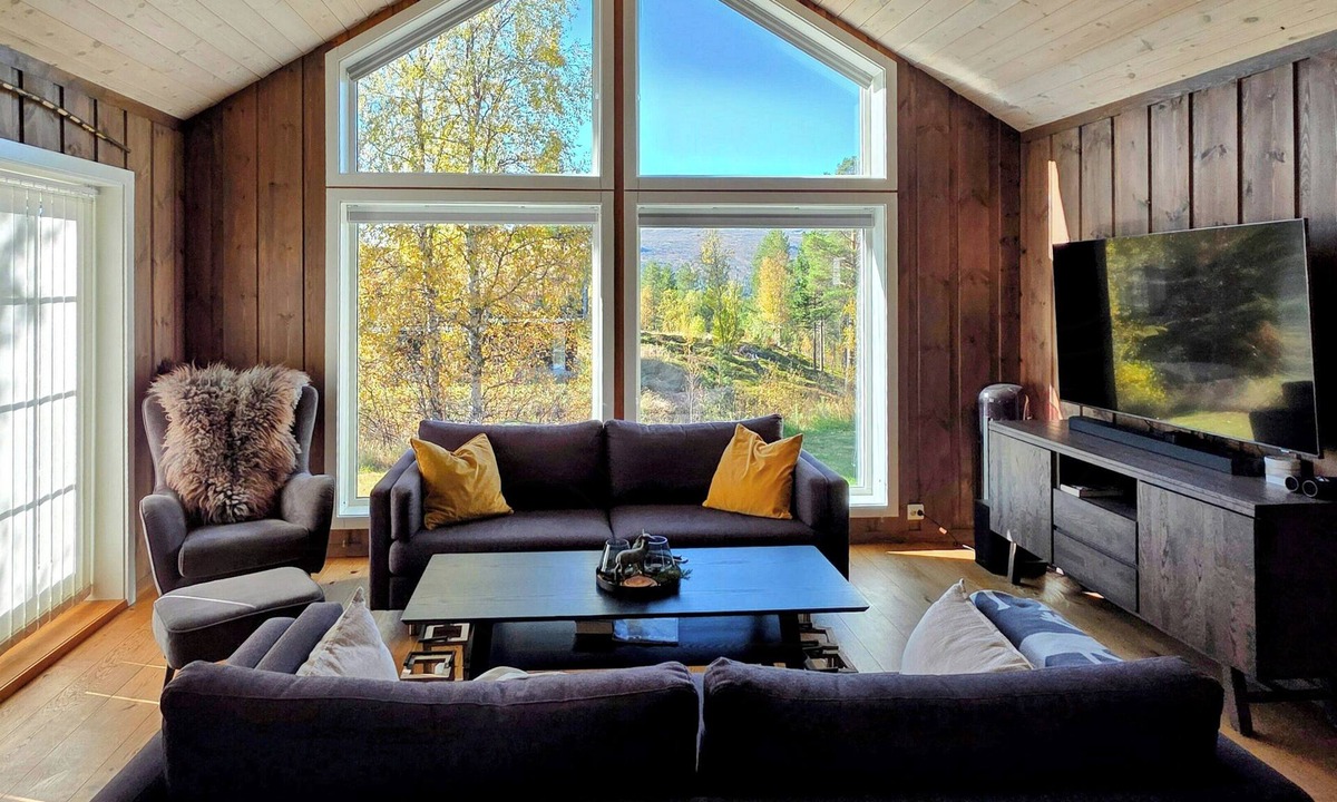 Bykle House | Cabin by Otra with fire pit near Hovden