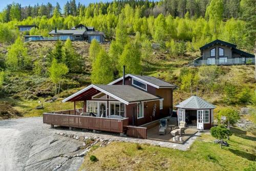 Nissedal House | Cabin With Two Living Rooms By Lake Nisser