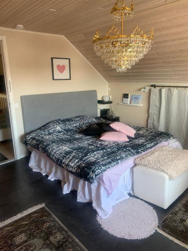 Lulea House | Charming room with big bed