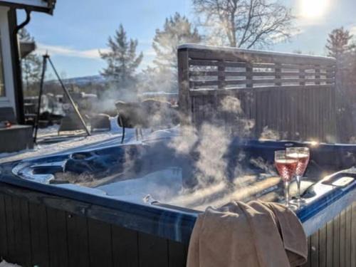 Midtre Gauldal House | Frøybu- eksklusiv fjellhytte med jacuzzi, stor terrasse og plass til 12