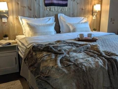 Midtre Gauldal House | Frøybu- eksklusiv fjellhytte med jacuzzi, stor terrasse og plass til 12