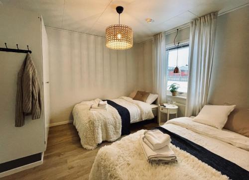 Boden Apartment | Guestly Homes - Spacious 3BR Apartment with 6 Beds