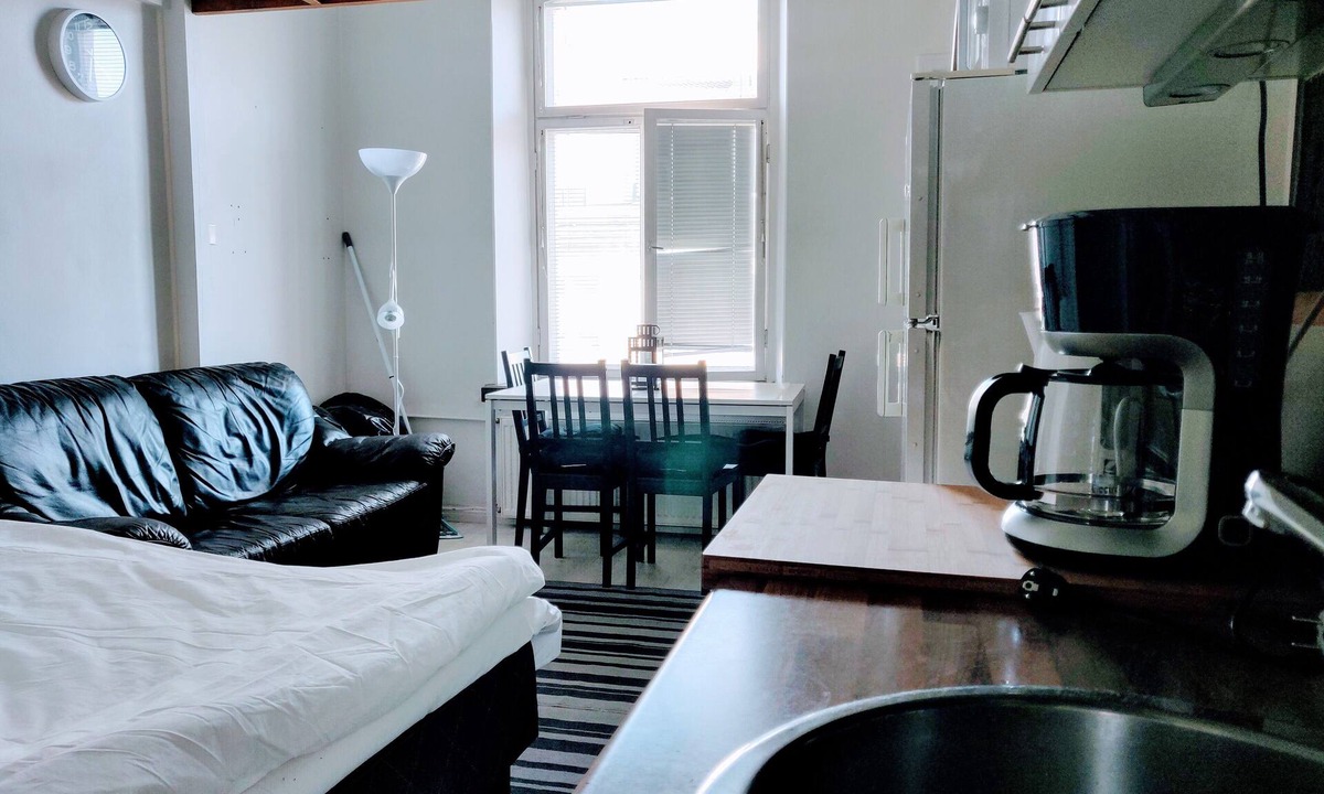 Kamppi Apartment | Helsinki city centre historic studio+loft