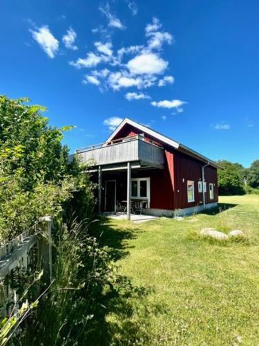 Nosund Apartment | Holiday apartment at the beautiful island Lyr "Magasinet 1"