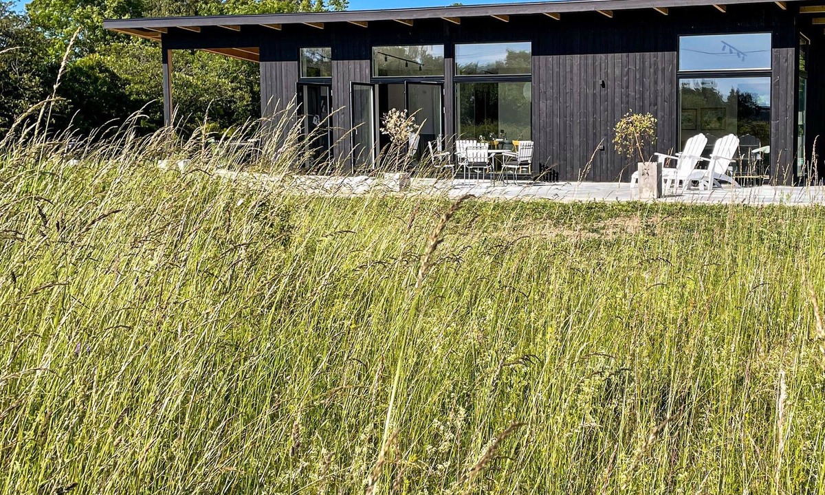 Sodvik House | Just one kilometer from the water, this modern and cozy cottage with a view of the Swedish nature aw