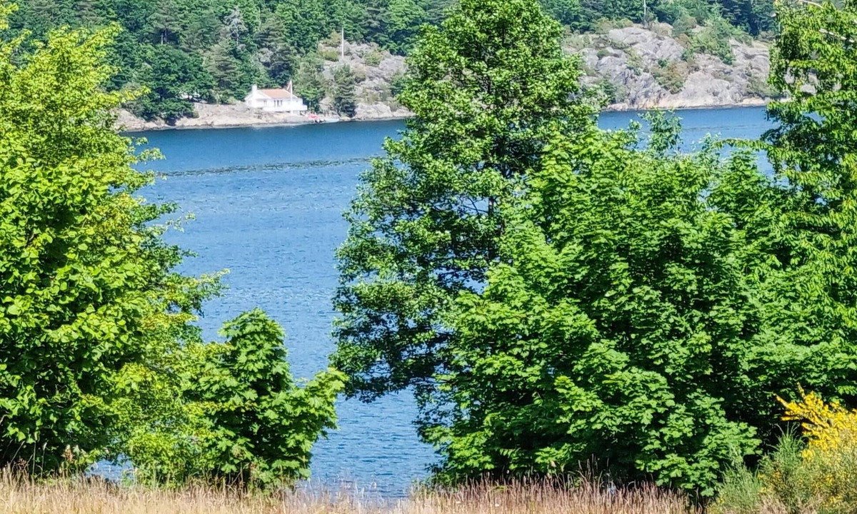 Risor House | Look forward to a great time with the family in this vacation home with fjord view!