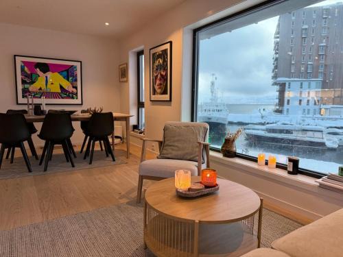 Tromso Apartment | Luxury Panorama Apartment by the Sea with Northern Lights View
