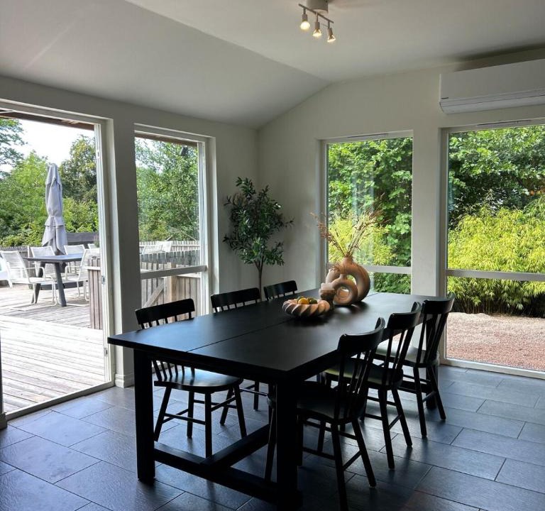 Hjarnarp Villa | Modern Log Cabin with Fireplace, Forest and EV Parking