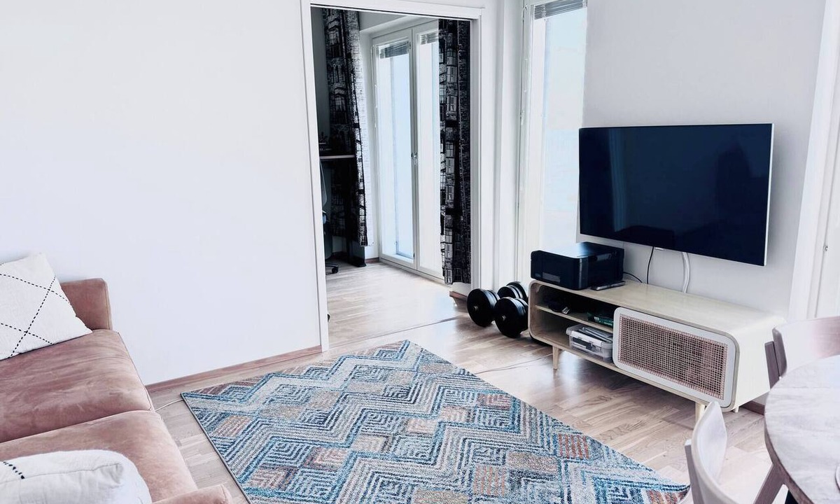 Pasila Apartment | Nordic Home Bliss with Sports