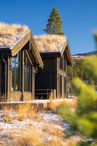 Vikberget House | Ny og moderne hytte med sauna, jacuzzi og eget spillrom med biljard og dart Gratis elbillading og strøm inkludert i prisen