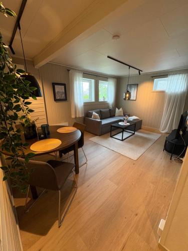 Kvaløysletta Apartment | Nyoppusset sokkelleilighet med bra bussforbindelser