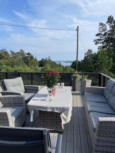 Tregde House | Peaceful seaside cabin with guest house - large private outdoor areas and boat available on request