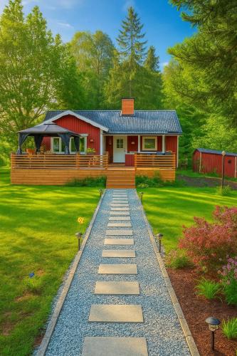 Sodertalje House | Röd Stuga by Falunio