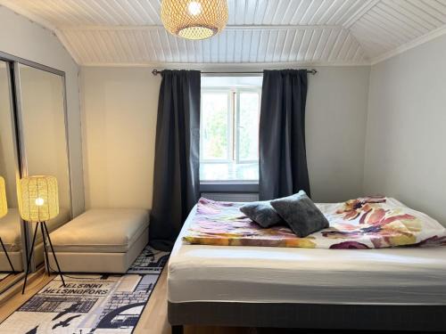 Karkkila Apartment | Rautatien ullakkohuoneisto