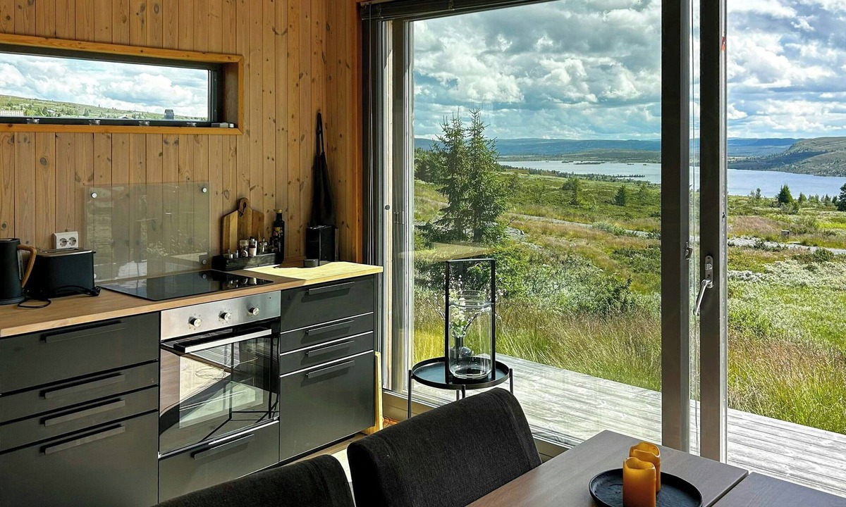 Vestre Slidre House | Small mountain cabin in pastoral area by Syndin