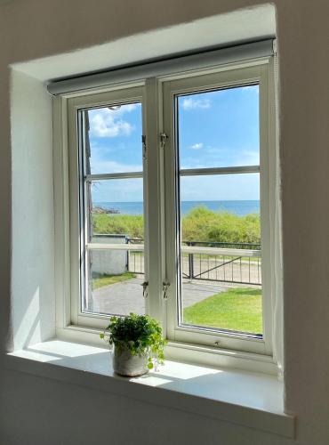 Abbekas House | Strandnära fritidshus i Abbekås