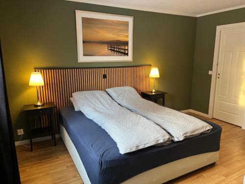 Amot Apartment | Stue, soverom og bad
