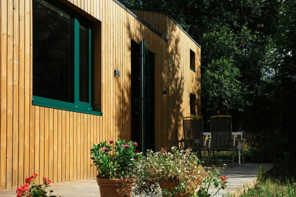 Elverum House | Tiny house between field and forest at Storberget