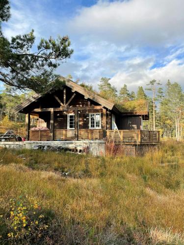 Treungen House | Traditional Log Cabin Near Treungen