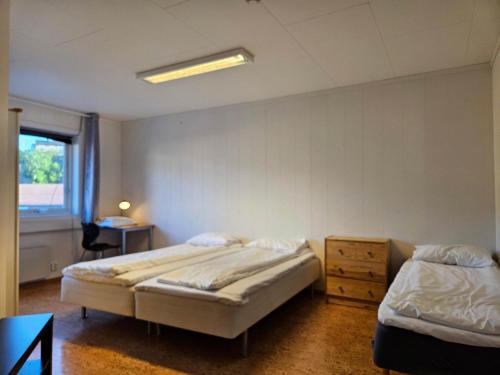 Vennesla Hostel | Triple room 207 near Kristiansand