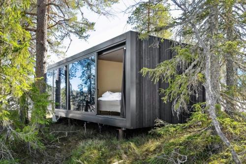 Flesberg House | Unique, modern cabin designed by Snhetta, located at Blefjell
