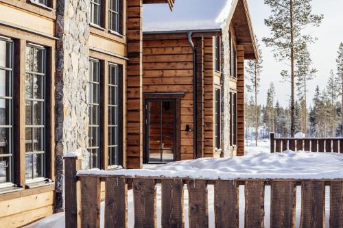 Idre House | Vargen Fjällstuga med bastu och brasa i Idre