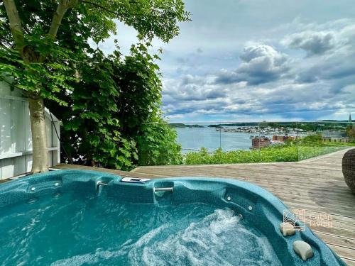 Kragero Villa | Villa in Kragerø with unique view, jacuzzi, boat space & outdoor kitchen