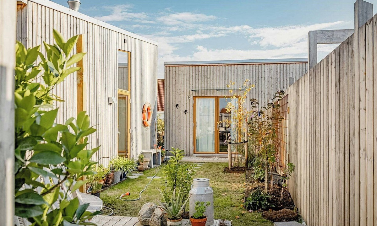 Kivik House | Wooden home among apple trees with ocean view