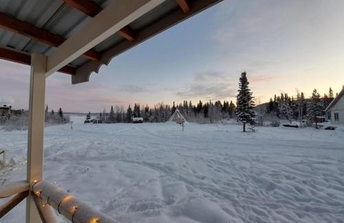 Jukkasjarvi House | Aurora River Camp Glass igloos & cabins