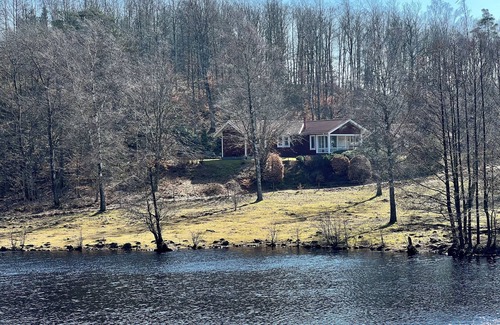 Oppinge House | Cozy vacation home with a view of the water and forest. Pet friendly.