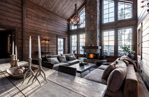 Idre House | Vargen Fjällstuga med bastu och brasa i Idre