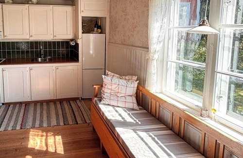 Jarbo House | 1800s timber house by the river in Gästrikland