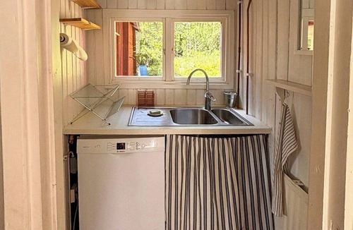 Jarbo House | 1800s timber house by the river in Gästrikland