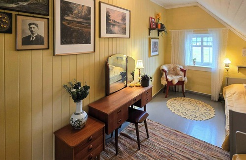 Værlandet House | 1899 timber cabin by the North Sea in Bulandet