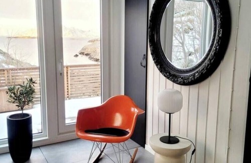 Skrova House | 1950s functionalist cabin with Vågakallen views
