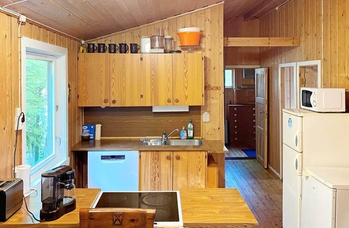 Vinnes House | 4 person holiday home in Reksteren