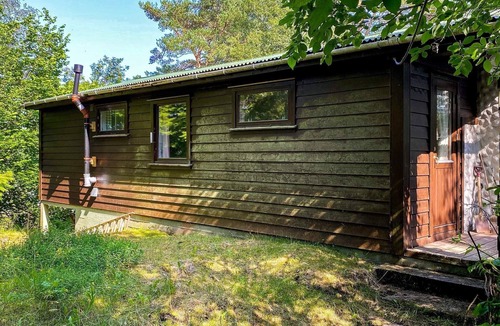 Vinnes House | 4 person holiday home in Reksteren