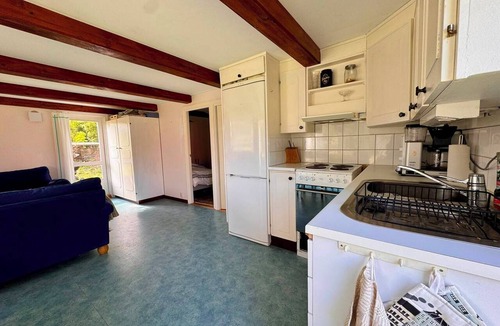 Lervik Cottage | A simple summer cottage located about 200 m from a fantastic sandy beach.