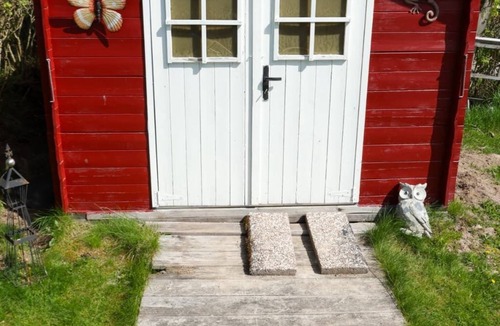 Åmål House | A Swedish-style house with horses and a canoe trail right outside the door