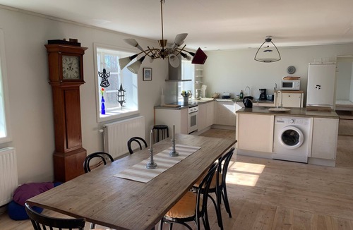 Jadraas Apartment | An apartment with generous space for socializing with family and friends.