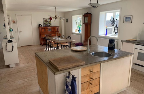 Jadraas Apartment | An apartment with generous space for socializing with family and friends.
