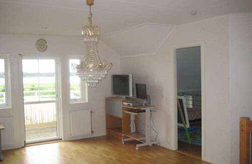 Kolmarden House | An idyllic villa on Bråviken (Lake Öster) with a large pool, a bocce court, a dock, and more
