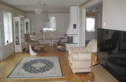 Kolmarden House | An idyllic villa on Bråviken (Lake Öster) with a large pool, a bocce court, a dock, and more