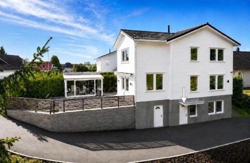 Ullensaker Apartment | Apartment near Gardermoen and downtown with parking and view over the creek in the garden